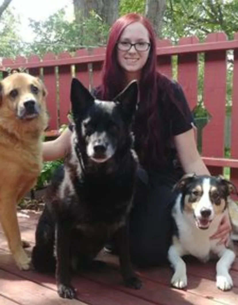 Shannon Patton with three dogs